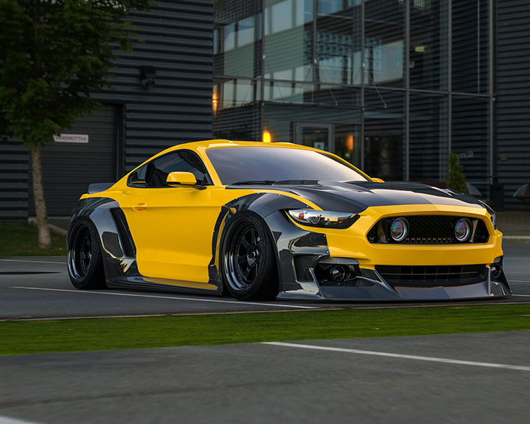 a yellow sports car parked in a parking lot